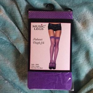 Thigh high purple fishnet tights